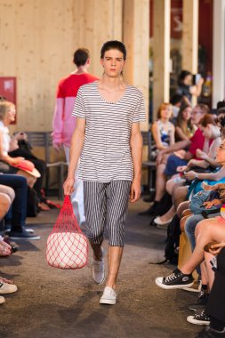 Models walking the runway in the Switzerland pavilion at Expo 20