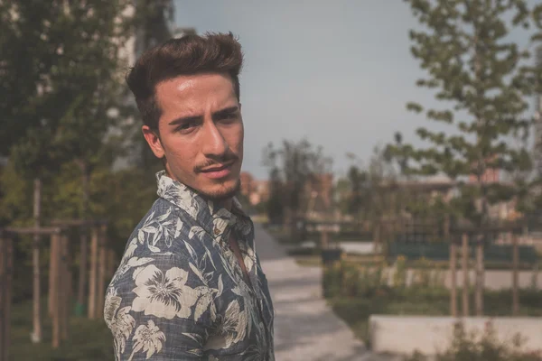 Young handsome man posing in the street — Stock Photo, Image