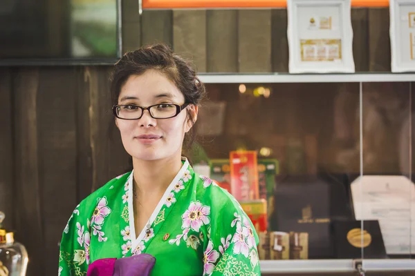 North Korean woman in her traditional dress at Expo 2015 in Mila — Stok fotoğraf