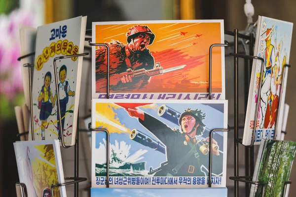 Propaganda postcards in the Nnorth Korea pavilion at Expo 2015 i — Stok fotoğraf