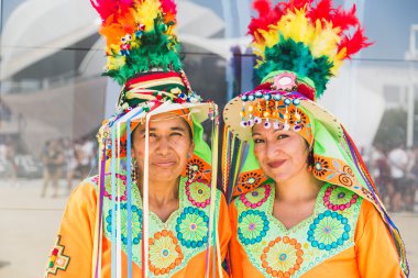 People taking part in the Bolivia National Day at Expo 2015 in M