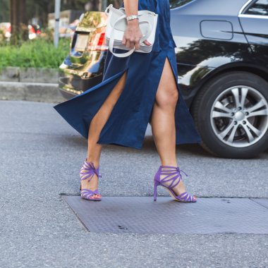 People gather outside Emporio Armani fashion show building in M