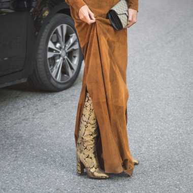 People gather outside Emporio Armani fashion show building in M