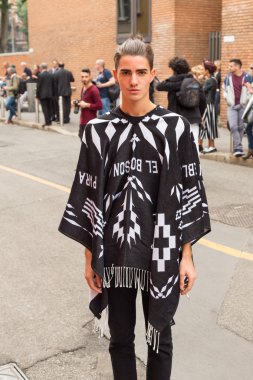 People gather outside Laura Biagiotti fashion show building in M