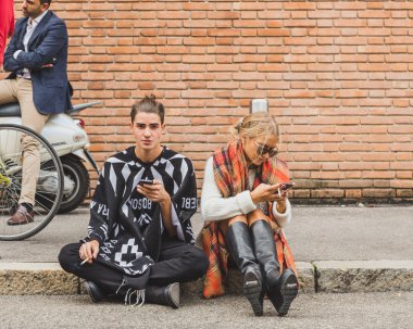 People gather outside Laura Biagiotti fashion show building in M