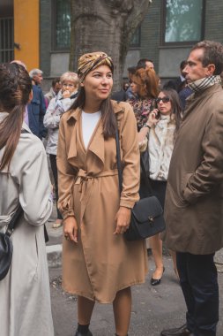 People outside Armani fashion show building in Milan, Italy