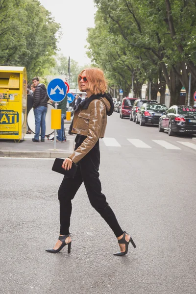People outside Armani fashion show building in Milan, Italy