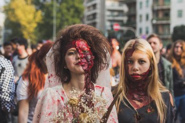 People take part in the Zombie Walk 2015 in Milan, Italy