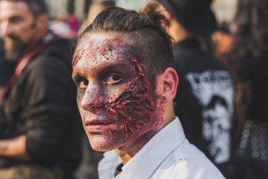 People take part in the Zombie Walk 2015 in Milan, Italy
