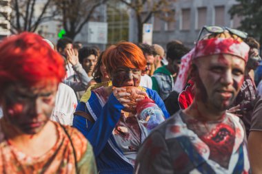 People take part in the Zombie Walk 2015 in Milan, Italy