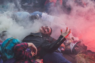 People take part in the Zombie Walk 2015 in Milan, Italy