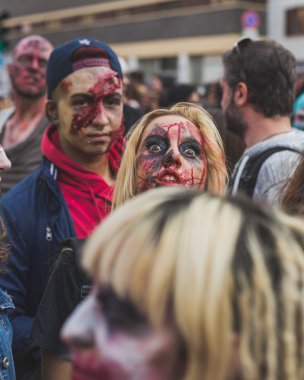 People take part in the Zombie Walk 2015 in Milan, Italy