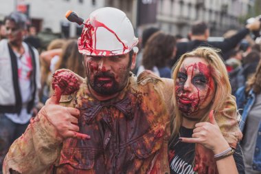 People take part in the Zombie Walk 2015 in Milan, Italy