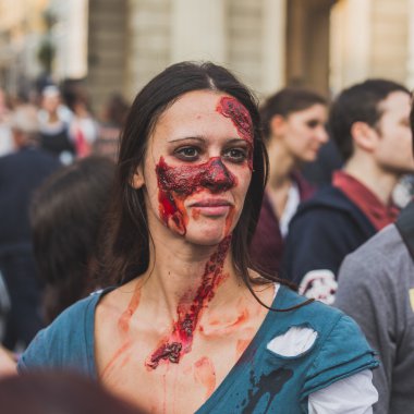 People take part in the Zombie Walk 2015 in Milan, Italy