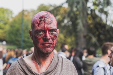 People take part in the Zombie Walk 2015 in Milan, Italy