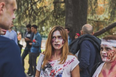 People take part in the Zombie Walk 2015 in Milan, Italy