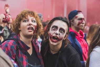 People take part in the Zombie Walk 2015 in Milan, Italy