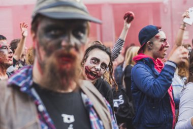 People take part in the Zombie Walk 2015 in Milan, Italy