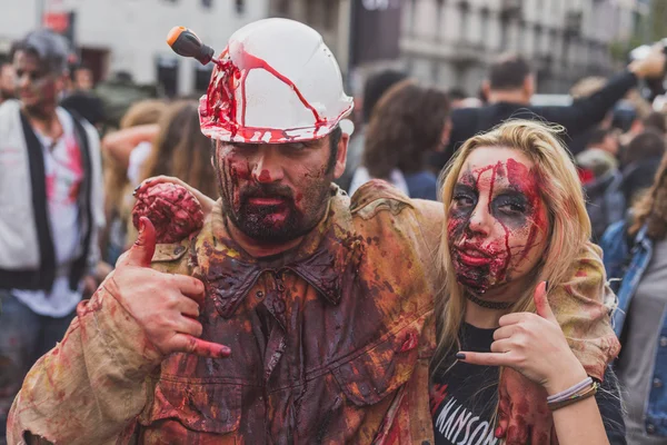 People take part in the Zombie Walk 2015 in Milan, Italy