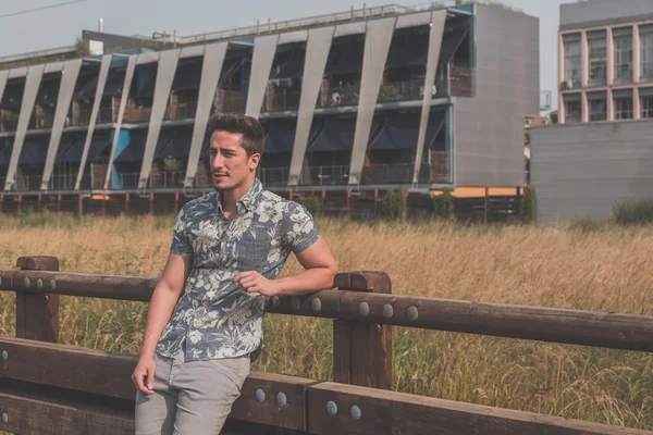 Young handsome man posing in the street — Stock Photo, Image