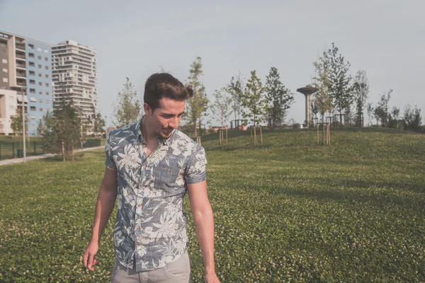 Young handsome man posing in the street — Stock Photo, Image