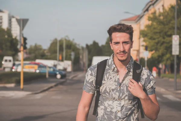 Young handsome man posing in the street — Stock Photo, Image