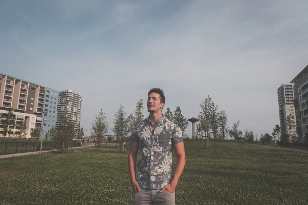 Young handsome man posing in the street — Stock Photo, Image