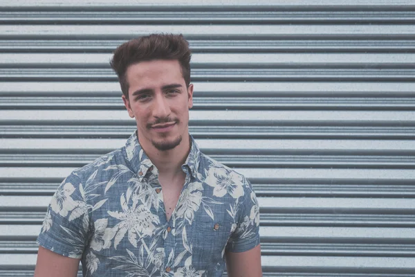 Young handsome man posing in the street — Stock Photo, Image