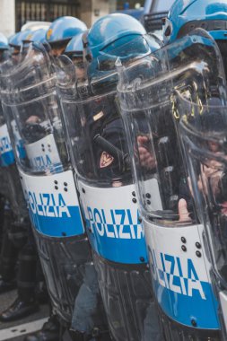 Riot police confronting the students in Milan, Italy