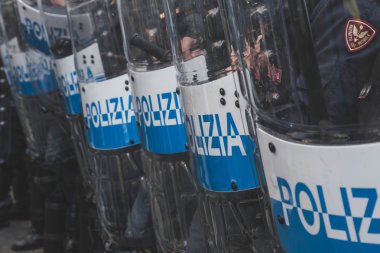 Riot police confronting the students in Milan, Italy