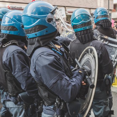 Riot police confronting the students in Milan, Italy
