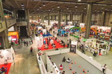 Top view of people and booths at G come giocare in Milan, Italy