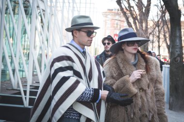 People outside Jil Sander fashion show building for Milan Men's 