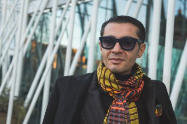 People outside Jil Sander fashion show building for Milan Men's 