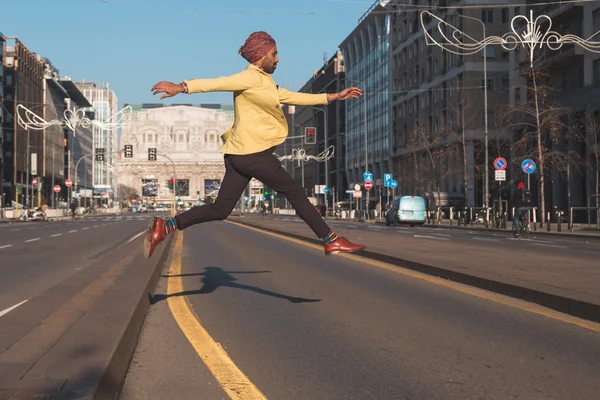 Indian handsome man jumping in an urban context — Stock Photo, Image