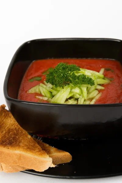 Imagen de sabrosa sopa de tomate con pan Imagen De Stock