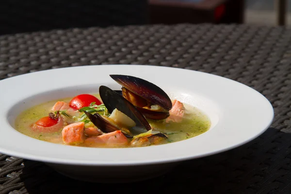 Image of tasty salmon soup with oysters in dish — Stock Photo, Image