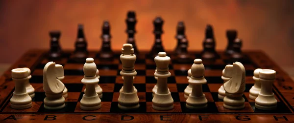 Chess game with pieces on the table — Stock Photo, Image