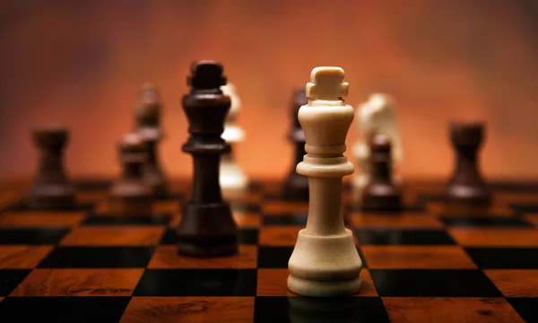 Chess game with pieces on the table — Stock Photo, Image