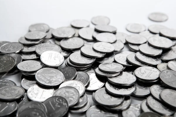 Pile of coins on a white Stock Picture