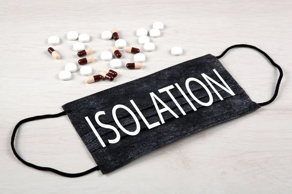 Medical Mask Inscription Isolation Medications Table — Stock Photo, Image