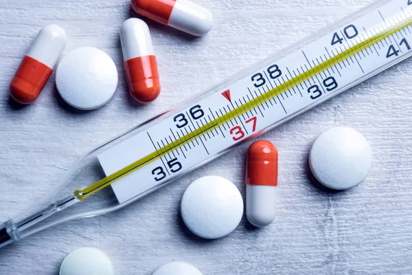 Mercury Medical Thermometer Pills Table Closeup — Stock Photo, Image