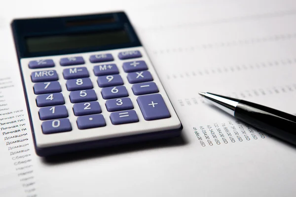 Work on the calculator and papers — Stock Photo, Image