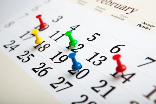 Large wall calendar with needles — Stock Photo, Image