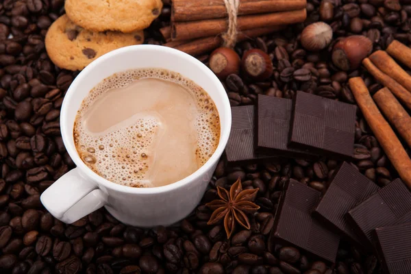 Coffee beans coffee with cream in a cup — Stock Photo, Image