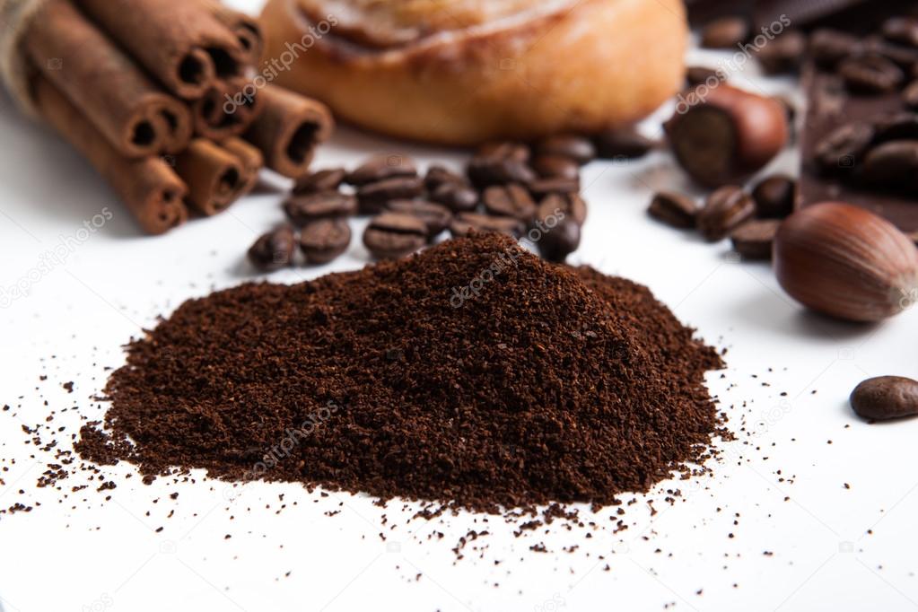 handful of ground coffee close up