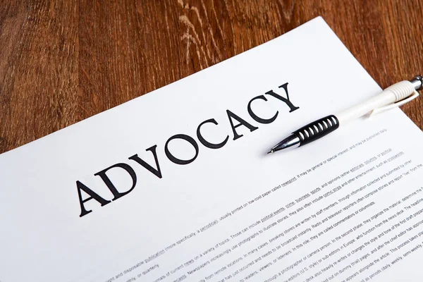 Document with the title of advocacy — Stock Photo, Image