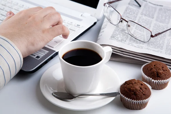 Businessman running and a cup of coffee — Stock Photo, Image