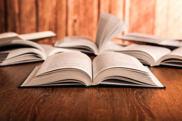 Open large book on a wood table — Stock Photo, Image