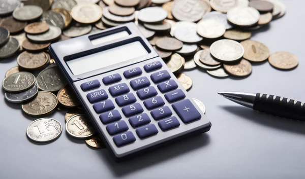 Handful of Russian rubles with calculator — Stock Photo, Image